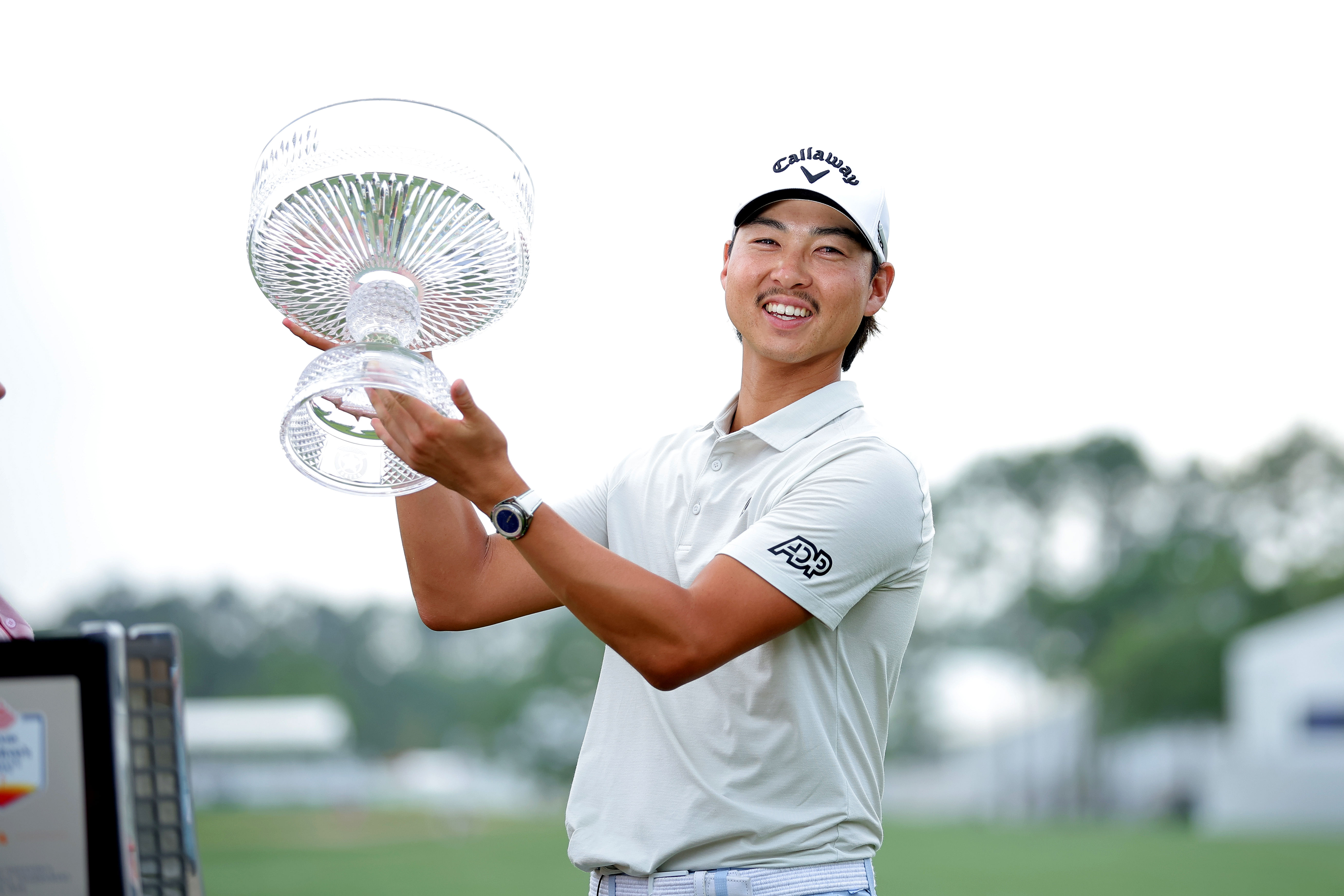 Min Woo Lee lifts the trophy at the 2025 Texas Children's Houston Open - Image Source: Imagn